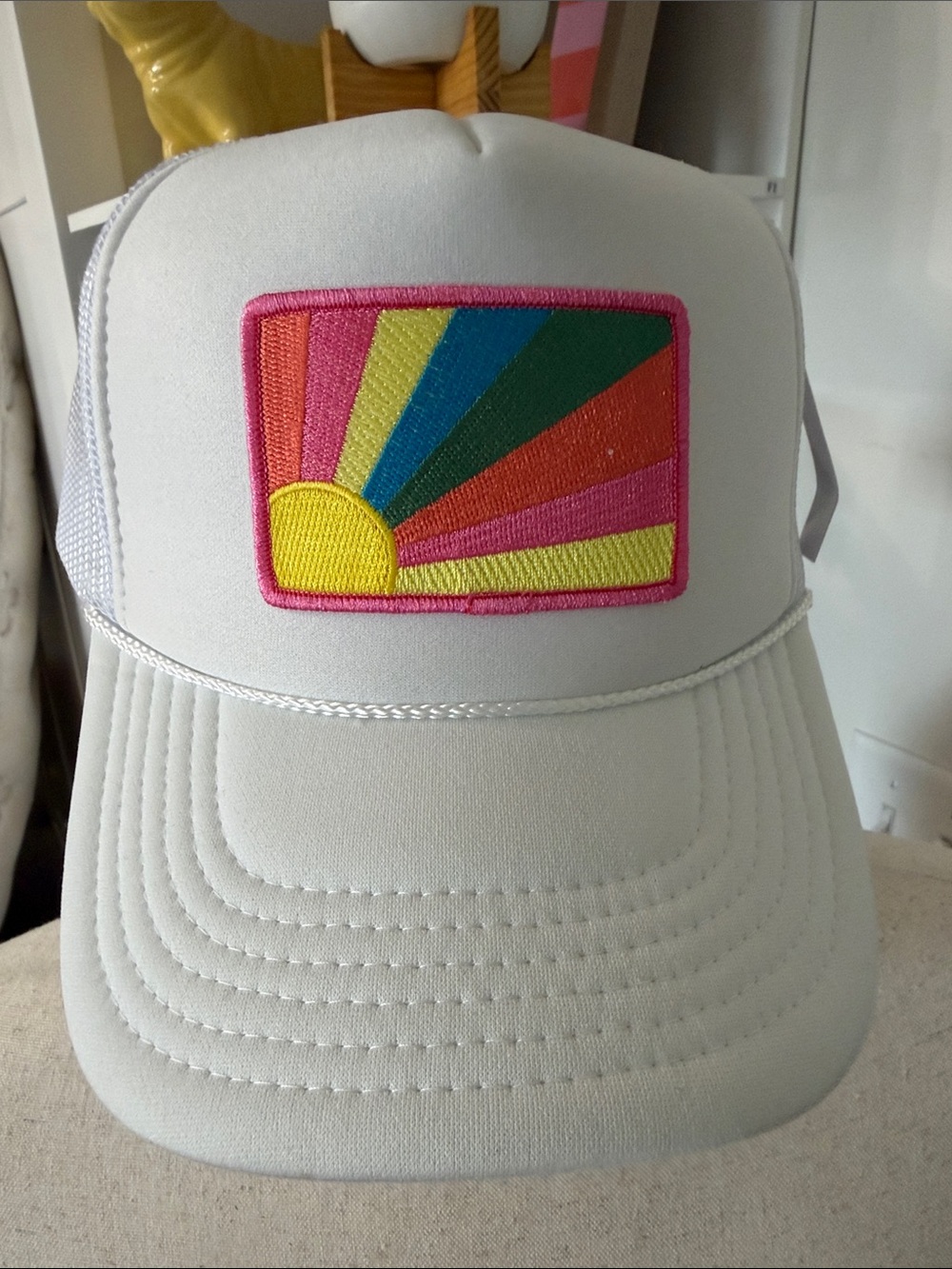 Katydid White Trucker Hat with Colorful Sunrise Patch